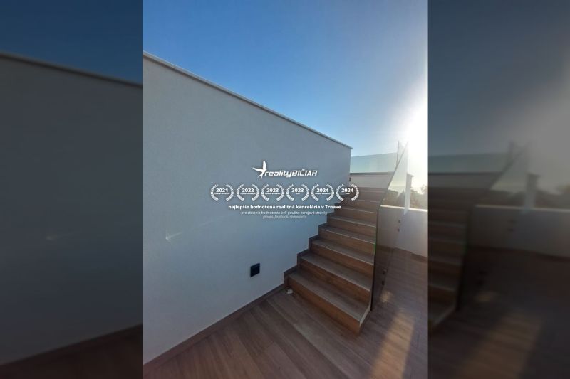 Stairs in the exterior of a recreational apartment with a wood-patterned floor in Privlaka.