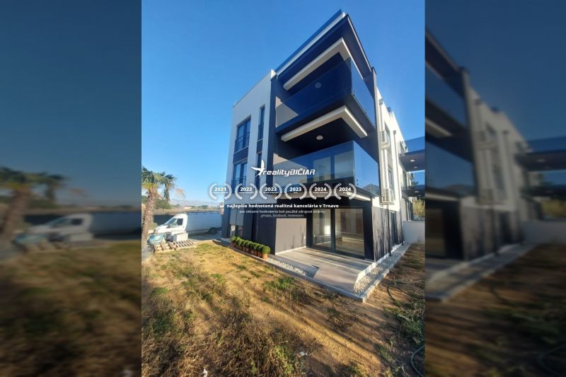 Three-story recreational apartment with a terrace in the town of Privlaka, on Privlaka Street.