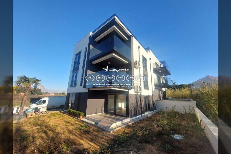 Recreational apartment in Privlaka on Privlaka Street with modern balconies and a terrace.