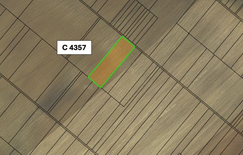 Aerial view of agricultural land in Veľký Šariš with a highlighted parcel.