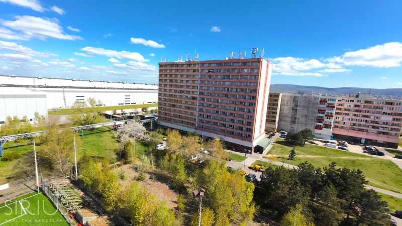 Apartment building in Bratislava, Devínska Nová Ves, Jána Jonáša, surrounded by greenery.