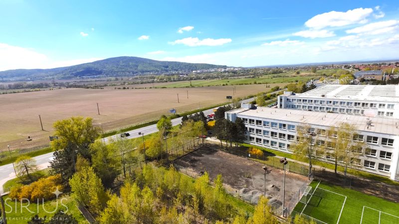 From Bratislava - Devínska Nová Ves, there is a view of the building and the surrounding nature on Jána Jonáša.