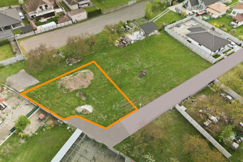 Land in Rohovce outlined in orange for planned housing in a green area.