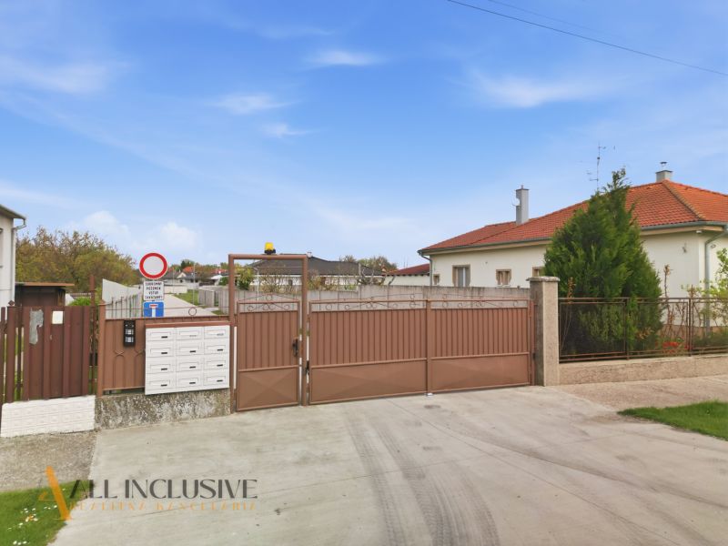 Gate with mailboxes, next to the house in Rohovce, Residential land.