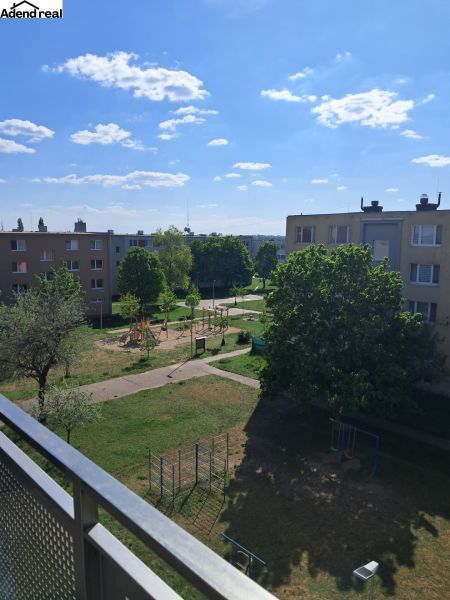 View of the playground and greenery from a 2-room apartment on Považská Street in Senec.