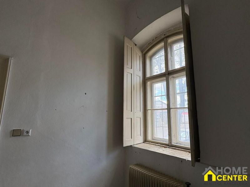 Interior with antique window and radiator, Unusual properties.