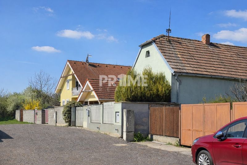 A family house in Dunajská Lužná on Krátka Street with a red roof.