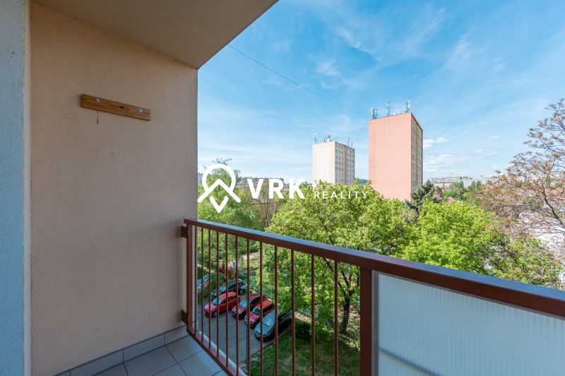 A balcony in a 2-room apartment on Južná trieda in Košice with a view of the surrounding buildings.