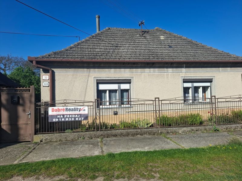 Family house in Tvrdošovce, fenced, with two windows and marked for sale.
