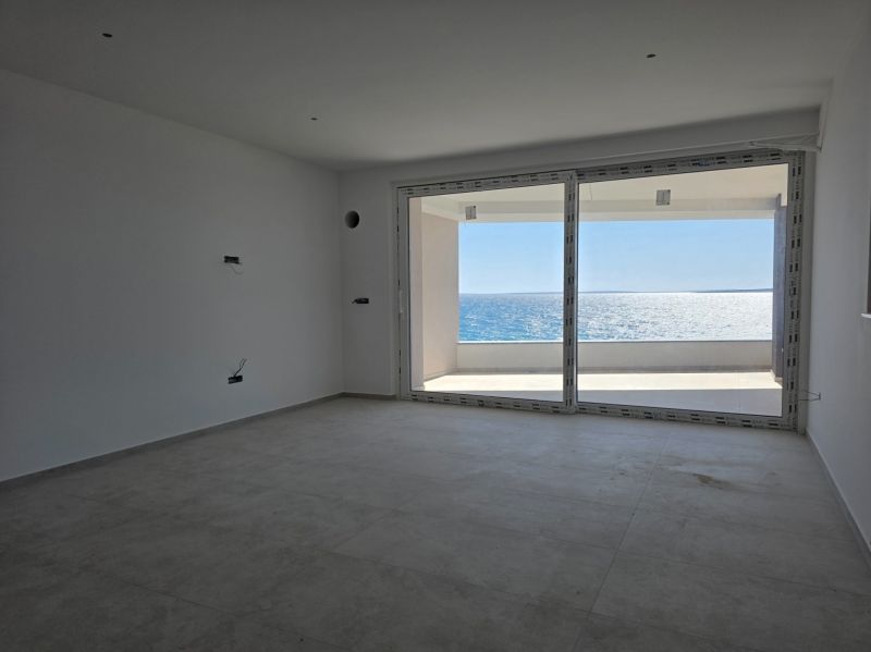 Open space with glass doors and sea view, 3-room apartment.