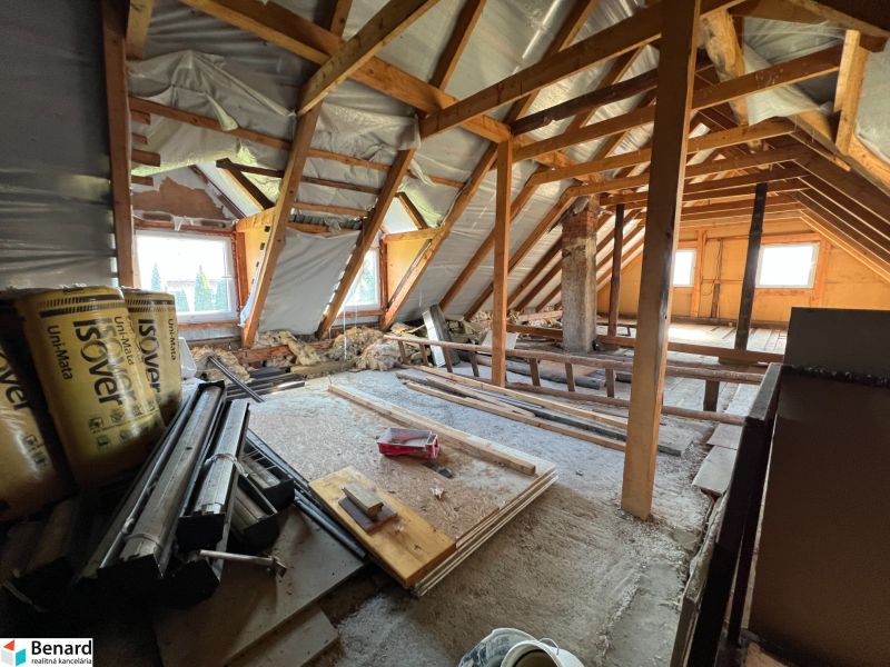The attic of a family house in Vislanka, ongoing renovation, visible construction materials.