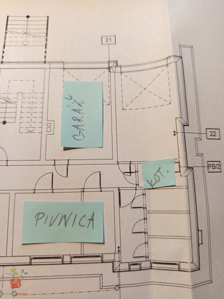 Floor plan with labeled rooms: garage, basement, boiler room in a 3-room apartment.