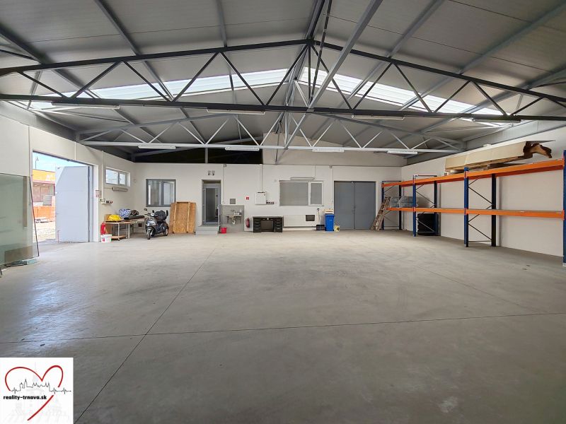 Interior with storage shelves, a motorcycle, and a workbench, Warehouses and halls.