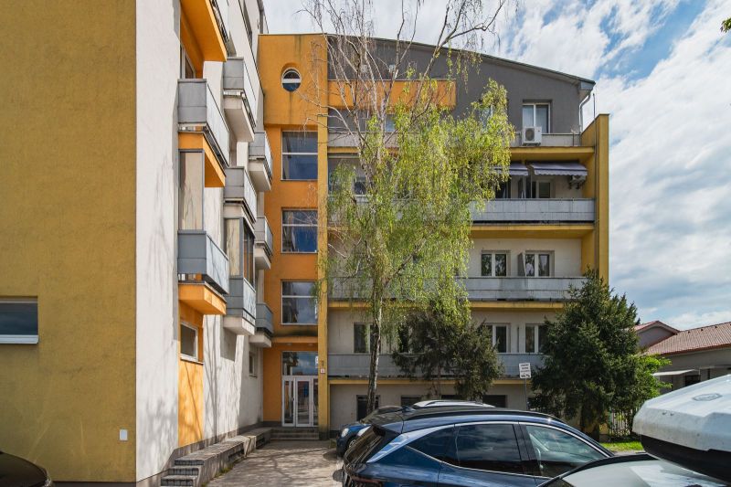 Apartment building with balconies and parking spaces in Bratislava - Podunajské Biskupice.