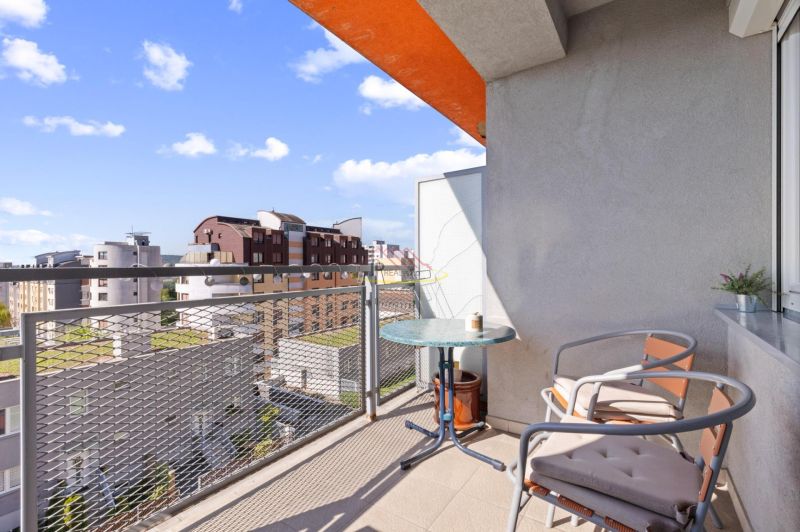 Balcony of a 2-room apartment with a view of the rooftops on Majerníkova Street in Bratislava.