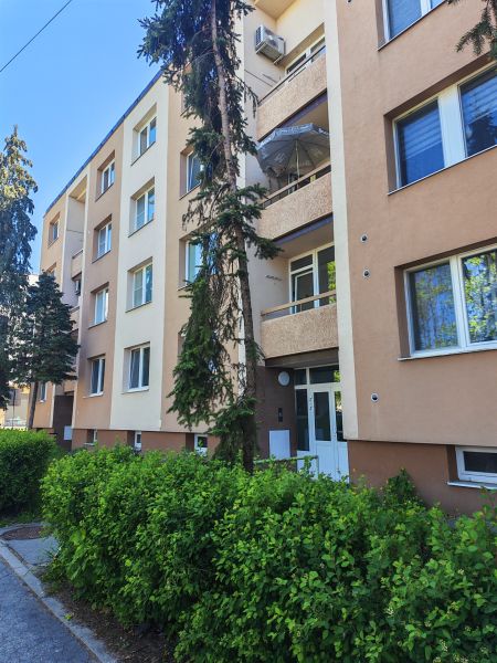 An apartment building on Bernolákova Street in Malacky surrounded by greenery offering 3-room apartments.