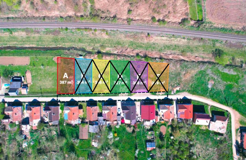 Aerial view of plots - housing in Hodejov, divided into individual parcels.