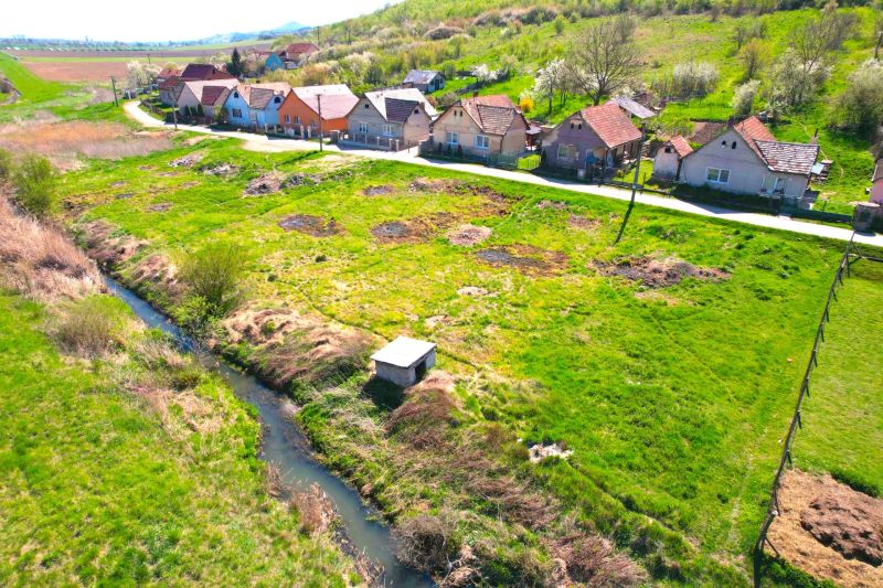 A view of green lands in Hodejov, ideal for living near a small stream.