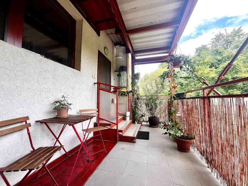Balcony of a 3-room apartment in Bernolákovo with ceramic tiles and plants.