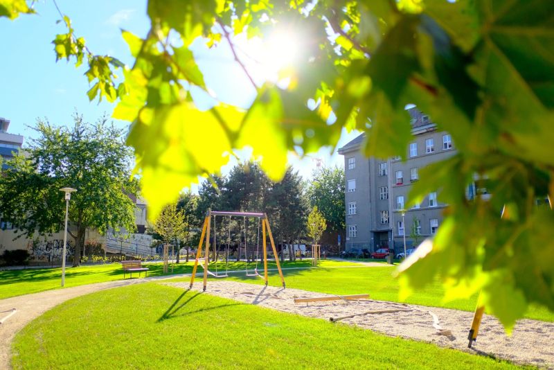 Park with swings and benches on Tabaková in Bratislava - Old Town.