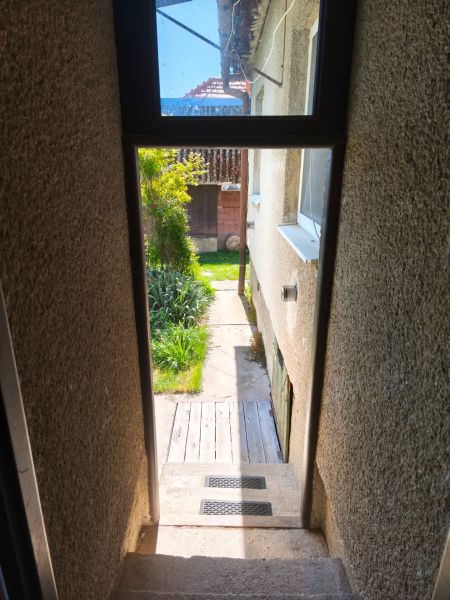 In Zlaté Moravce, the entrance of a family house with a view of the garden.