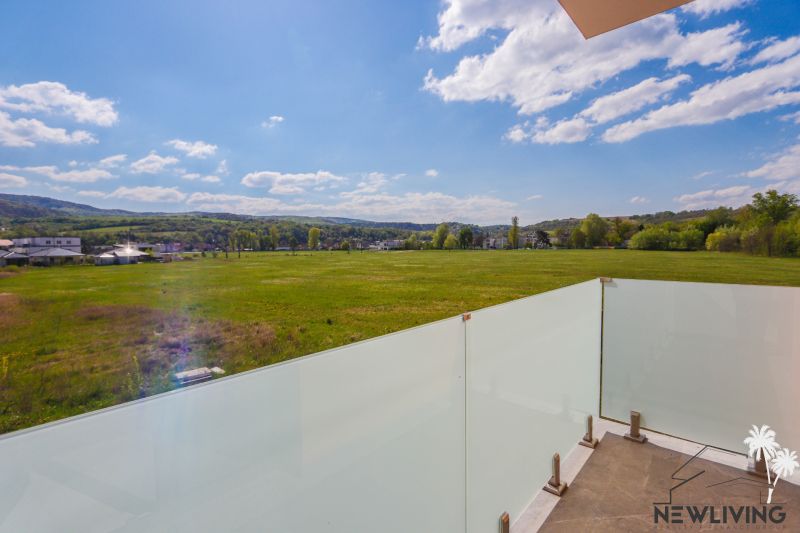 A balcony in a 2-room apartment with a view of nature and fields on Moravanska Street in Banka.