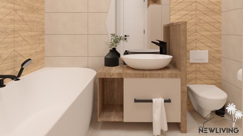 Bathroom in a 2-room apartment with a bathtub, a sink on a wooden decor, and ceramic tiles.