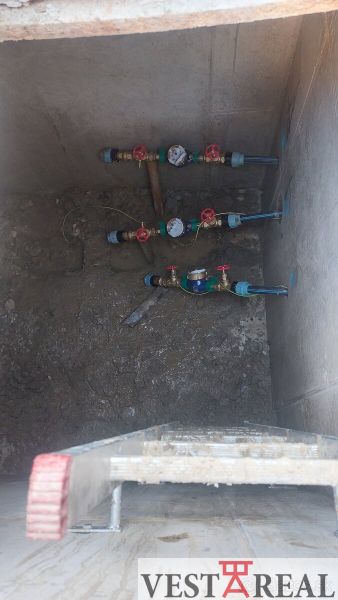 Underground installation with water meters and valves for plots - housing in Malá Mača.