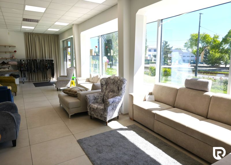 Commercial spaces offering comfortable sofas and armchairs with large windows.