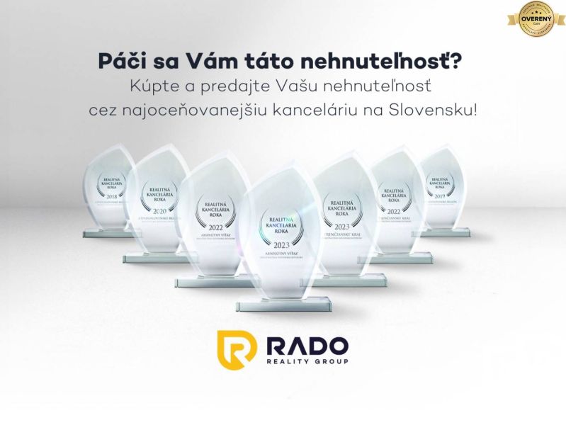 Awards for the real estate agency with the inscription RADO Reality Group and advertisement for services.