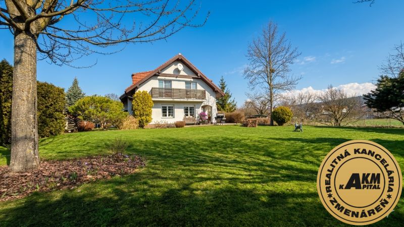 A family house in Sliač with a large garden and a well-maintained lawn.