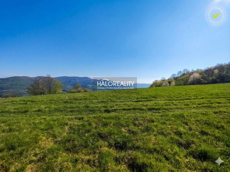 Green recreational plots in Horné Hámre with a panorama of mountains and forests.