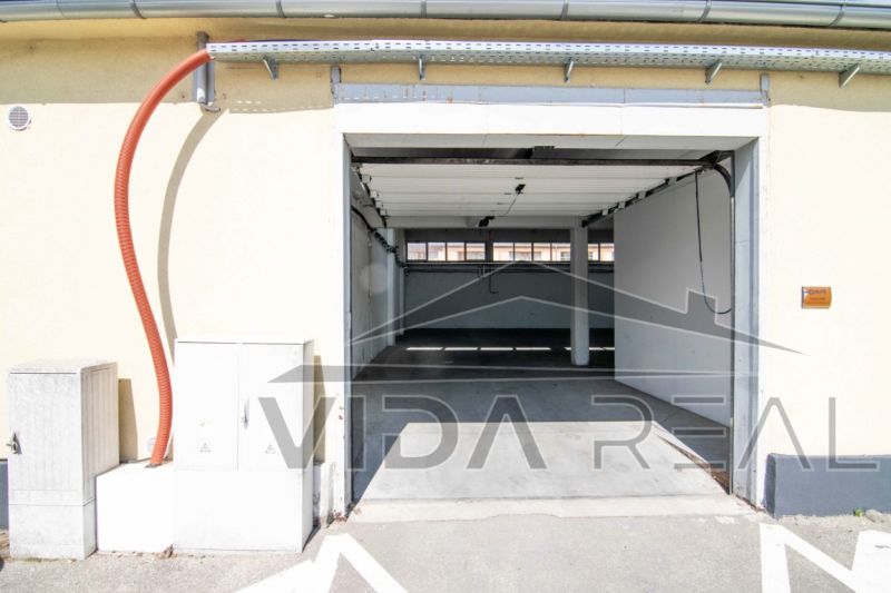 Open entrance to the garage in warehouses and halls on Coburgova Street, Trnava.