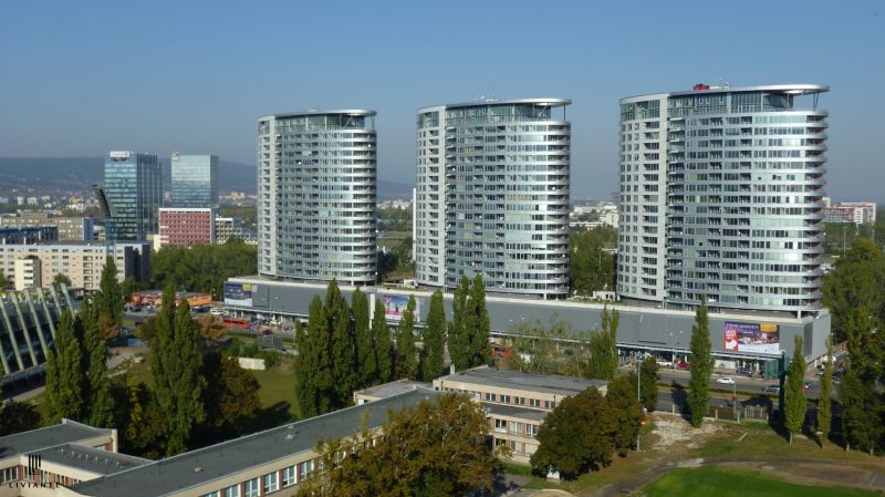 Panorama of Bajkalská in Bratislava with a trio of high-rise buildings and the surroundings of Garages.