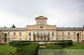A historic building with landscaped gardens suitable for residential land in Palárikovo.