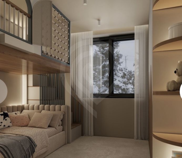 Children's room in a holiday apartment with a bunk bed and decorative pillows.