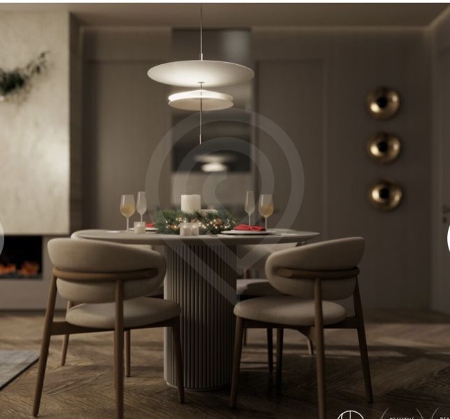 Dining nook with candles and soft lighting, floor with wooden decor.