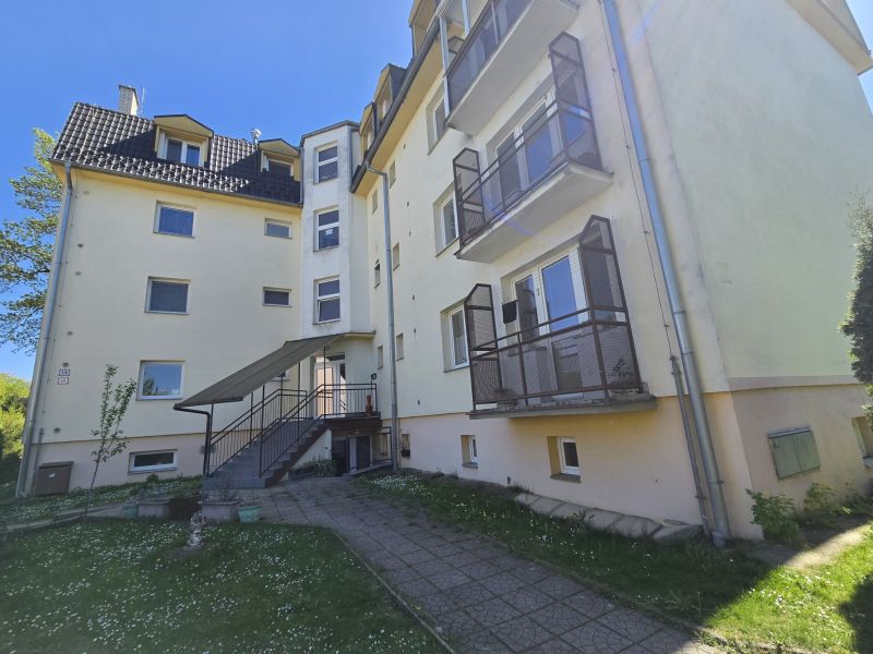 Apartment building on Cukrovarska Street in Trenčianska Teplá, with a well-maintained lawn.