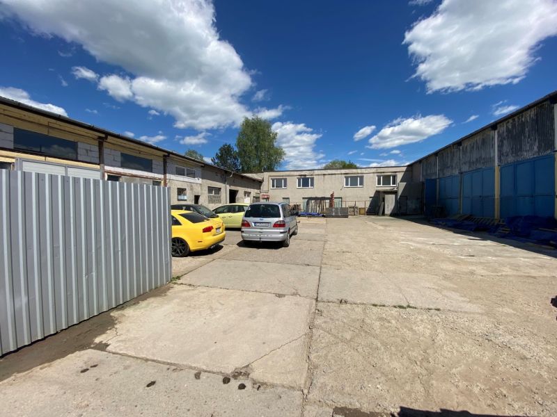 An industrial building surrounded by cars on Košická Street in Rimavská Sobota, Unusual properties.