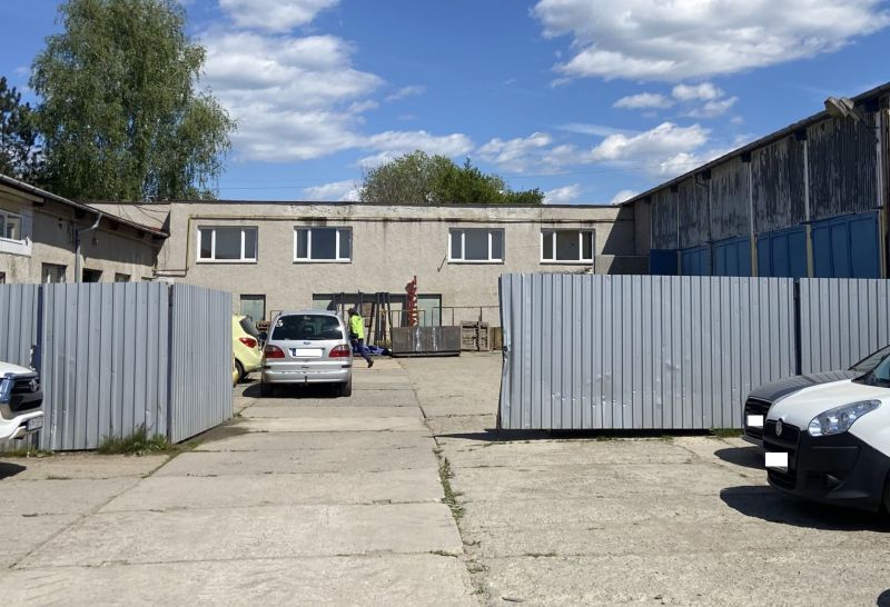 Cars and an industrial building on Košická Road, Rimavská Sobota, Special properties.