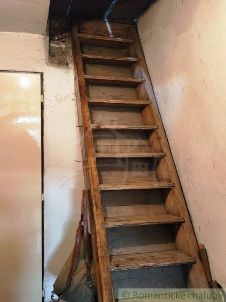 Antique wooden stairs in a family house.