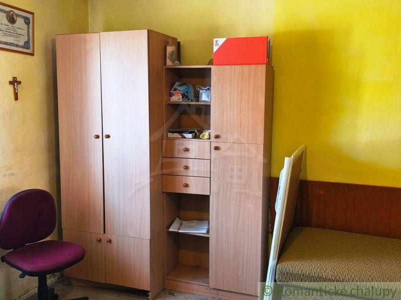 A room with wooden decor furniture in a family house.