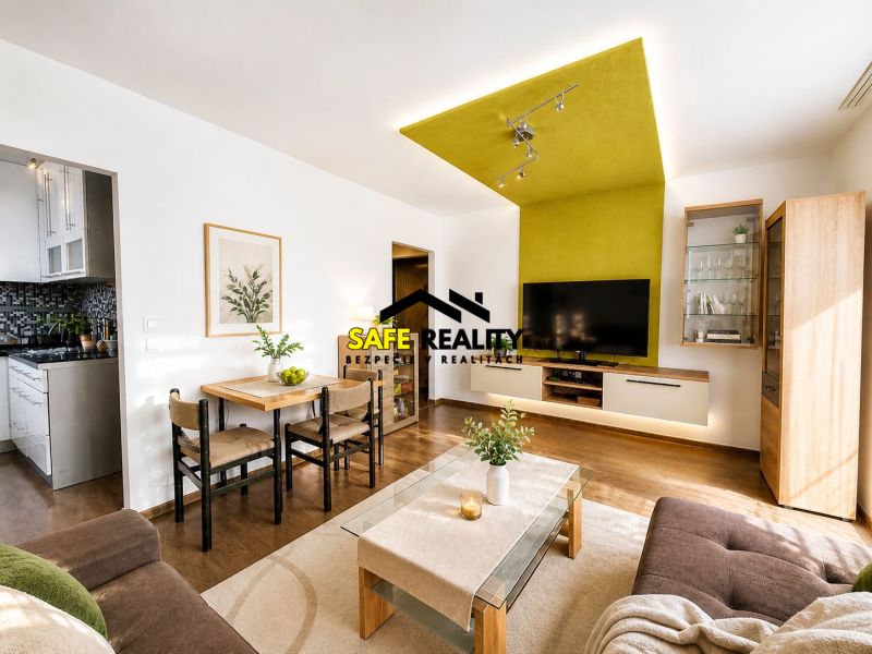 Living room with a sofa, dining table, and wood-patterned flooring.
