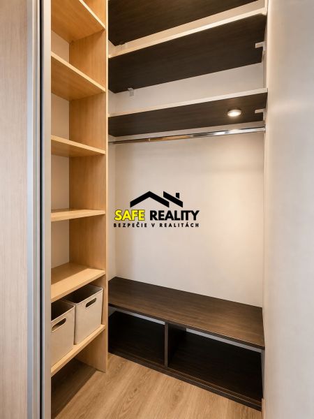 Storage space in a 3-room apartment with shelves and a floor with a wood decor.