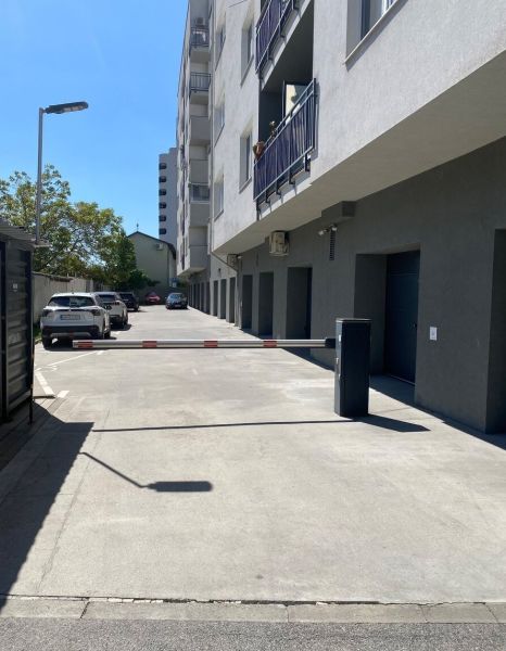 Parking lot in front of the garages on Kazanská Street in Bratislava-Podunajské Biskupice.