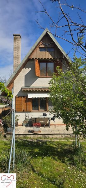 Garden with a cottage on Nové Vinohrady Street in Suchá nad Parnou.