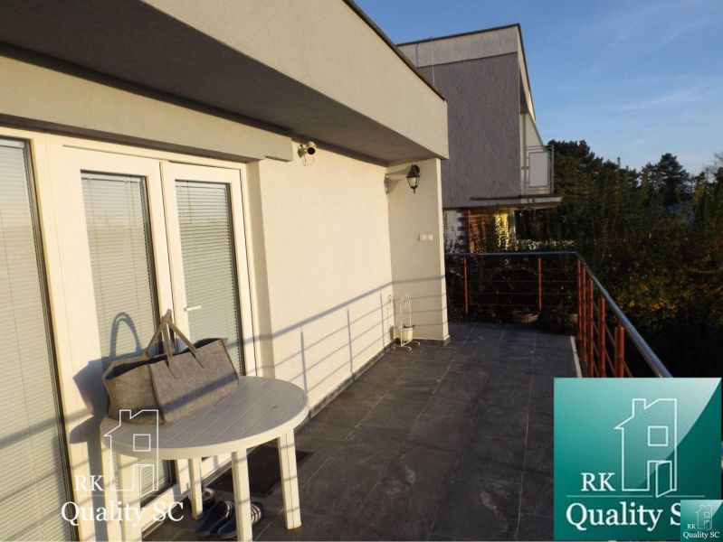 Balcony at the cottage on SUNNY LAKES SOUTH in Senec with a metal railing.