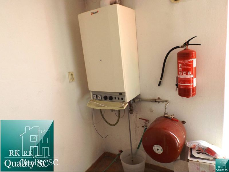 Combination of a gas boiler and a fire extinguisher in a family house.