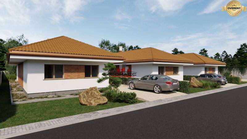 Family houses in the village of Veselé on Veselé Street with parking lots and garden landscaping.