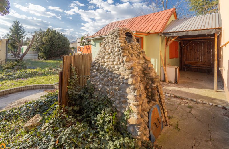 A family house on Mlynska Street in Piešťany with a stone oven and a garden.